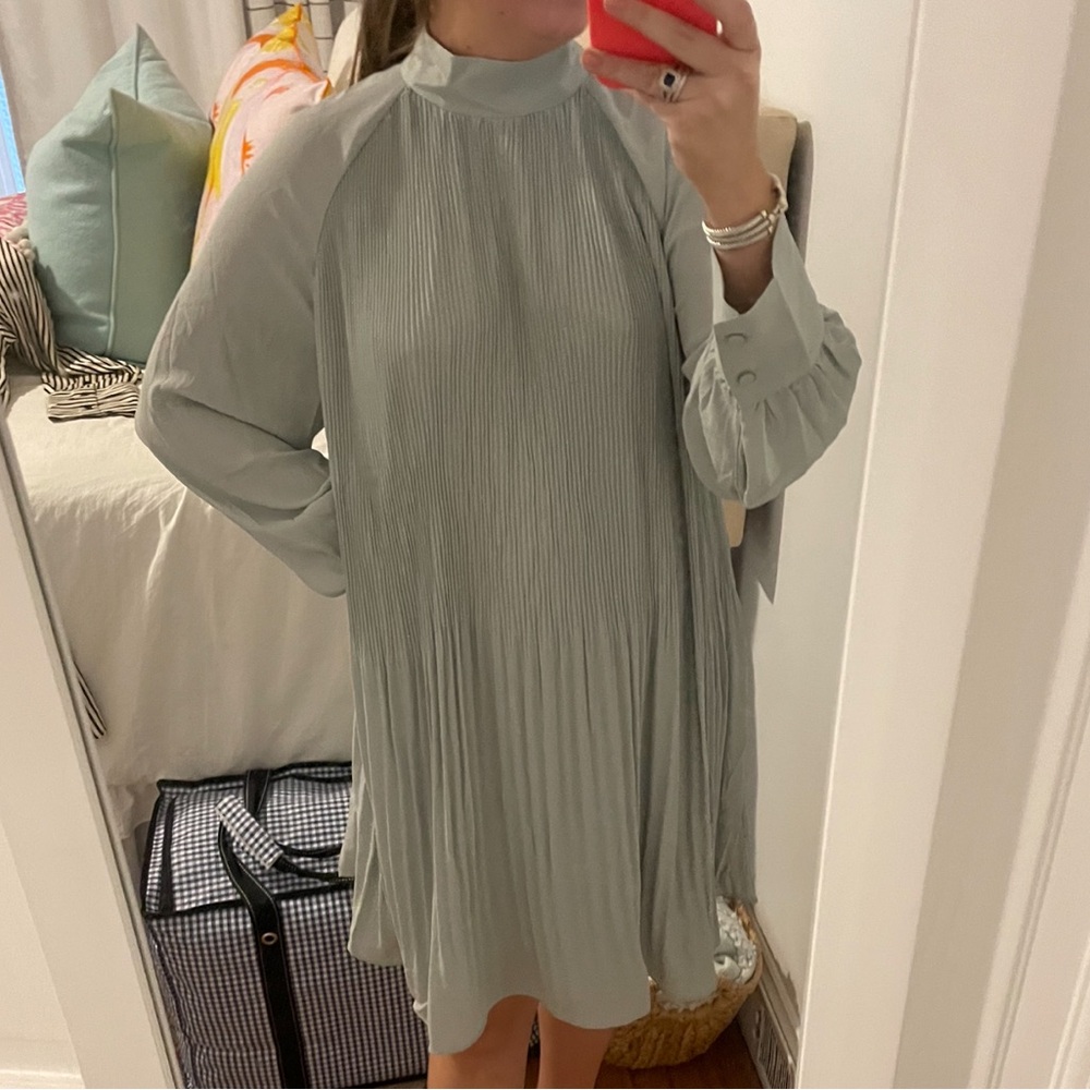 Green pleated dress